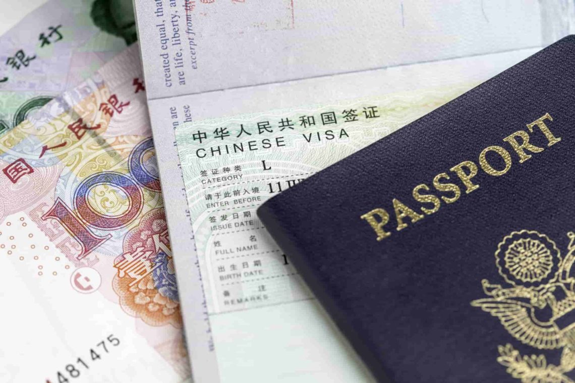 Chinese-Visa-with-Yuan-RMB-and-Passport-scaled